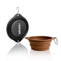 Two collapsible pet bowls, one black and one brown, on a white background.
