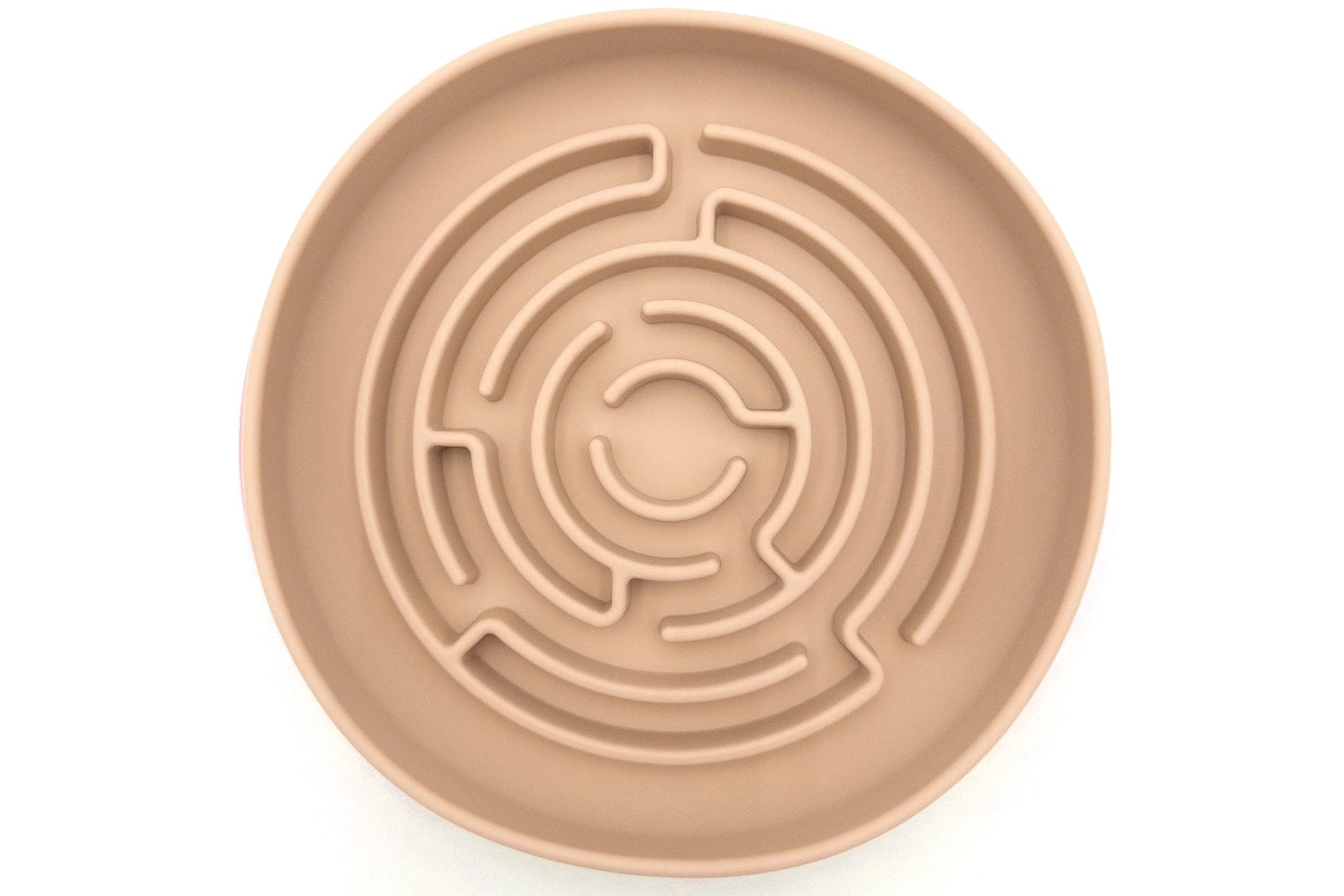 A round beige silicone puzzle feeder with a concentric maze design, shown from a top-down view on a white background.